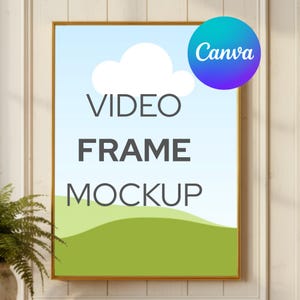 May include: A framed video mockup with a light blue sky, white cloud, and green landscape. The text "VIDEO FRAME MOCKUP" is displayed in bold, dark gray letters. A blue and teal Canva logo is in the upper right corner.