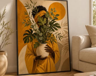 May include: A framed wall art print featuring a person wearing a mustard yellow garment and headwrap, holding a white ceramic vase filled with green monstera and leafy foliage. The background displays abstract yellow circles and soft beige shapes.