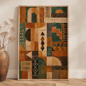May include: A rectangular wall art print in a light wood frame featuring a geometric composition of teal, ochre, brown, and cream shapes. The design includes arches, triangles, diamonds, and vertical lines arranged in a grid-like pattern.