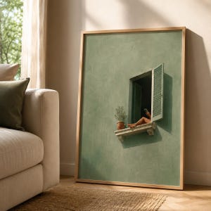 May include: A framed wall art print featuring a sage green textured wall with an open window. The window has green shutters and a stone ledge holding a small potted plant. A figure is visible sitting on the ledge, looking at a mobile device.