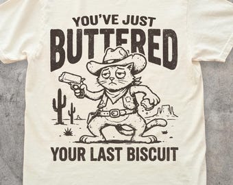 You’ve Just Buttered Your Last Biscuit T-Shirt, Funny Cowboy Cat Meme Tee, Vintage Western Humor Shirt, Retro Animal Graphic Top