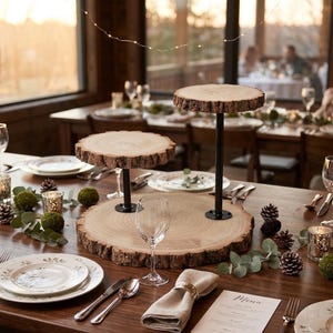 May include: A handmade wooden sign with the text "Welcome" in a playful font. The sign is painted white with a distressed finish, and features a decorative floral design in shades of pink and green. It measures approximately 12 inches wide.