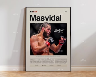May include: A framed poster featuring the name "Masvidal" in bold black letters. The poster includes a photograph of a muscular man wearing UFC gloves. The poster has a beige background and a black frame.