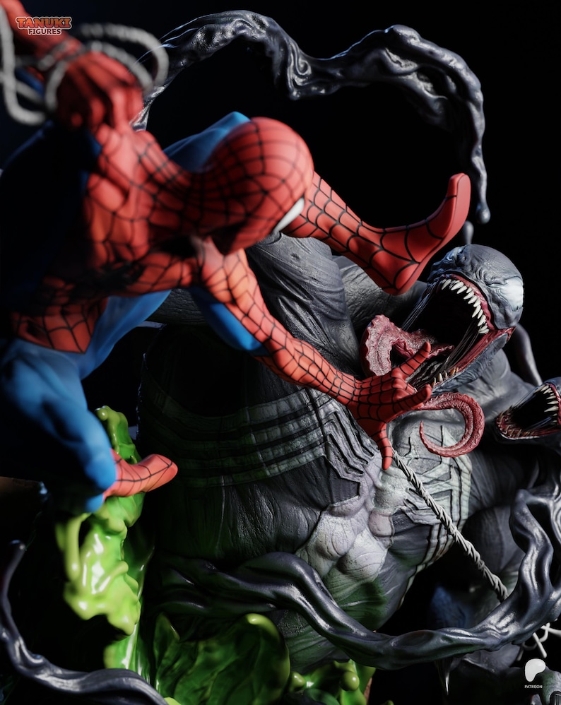 May include: A detailed figurine depicting Spider-Man in a dynamic pose, battling Venom. Spider-Man is in his classic red and blue suit, while Venom is a large, dark figure with a menacing expression. The base features green and black elements.