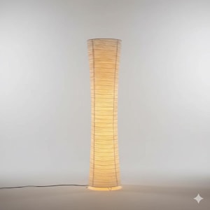 May include: A tall, beige floor lamp with a cylindrical, textured shade. The lamp has a slender, hourglass shape and emits a warm, soft light. The lamp is approximately 152 cm tall and is suitable for living rooms and bedrooms.