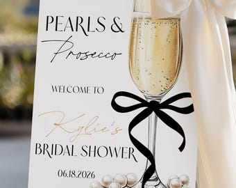 Modello di cartello di benvenuto con perle e prosecco e fiocco nero, poster elegante e personalizzabile per brunch, download digitale immediato da Canva.