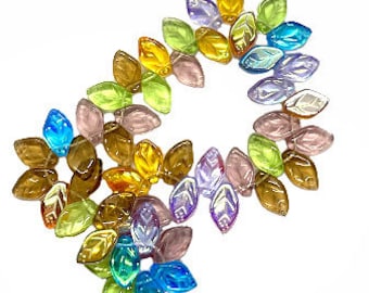 18 x 12mm Glass Lampwork Beads B/'sue Boutiques 10 Pieces Item04604 Transparent Clear and White Middle With Gold Swirls and Black Ends