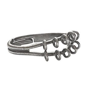 May include: A silver-toned ring with a unique design. The ring features a double band with vertical bars and a series of small, circular loops. The metal has a slightly aged appearance, giving it a vintage or handcrafted feel.