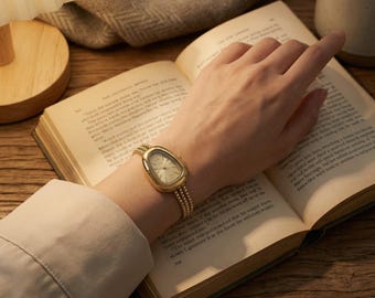 Reloj de pulsera con cadena de oro para mujer / Reloj minimalista con esfera ovalada / Correa elegante de regalo