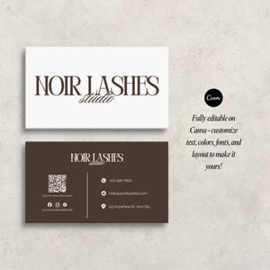 May include: Two business cards with the text "NOIR LASHES Studio". One card is white with brown text, the other is brown with white text. The brown card includes a QR code, phone number, email, and address. The Canva logo and text are on the right.