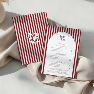 May include: Two brochures with a red and white striped pattern. One brochure displays the text "bare skin studio" in a white font. The other brochure is a price menu with the same logo and a list of facial and advanced treatments.