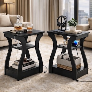 May include: A white ceramic mug with a black handle and the text "But First, Coffee" in a black, handwritten-style font. The mug is on a white surface.