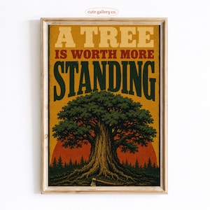 May include: A framed poster featuring a large, detailed oak tree illustration against a sunset background. The text reads A TREE IS WORTH MORE STANDING in bold, vintage-style typography. A small axe lies at the base of the tree trunk.