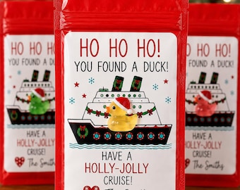 May include: A red pouch featuring a white label with the text HO HO HO! YOU FOUND A DUCK! HAVE A HOLLY-JOLLY CRUISE! The Smiths. The label displays a cruise ship illustration with a small yellow rubber duck wearing a Santa hat attached to it.