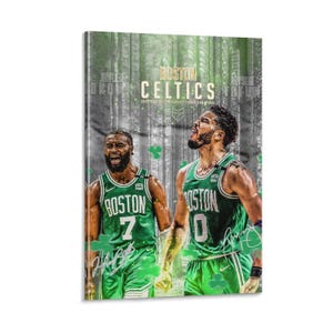 May include: A framed print featuring two Boston Celtics basketball players in green jerseys. The print has the words "Boston Celtics" and the players' signatures. The background has a forest-like design with green accents.