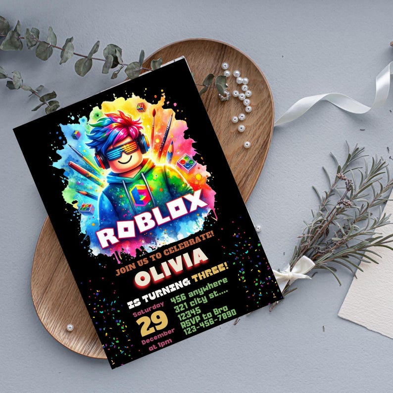May include: A black invitation card with the Roblox logo and a colorful illustration of a Roblox character. The card reads "Join us to celebrate! Olivia is turning three!" with event details.