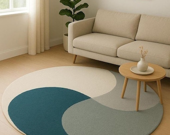 Handgetufteter Wirbelteppich aus Neuseelandwolle: Abstrakter Kreis in Türkis und Salbei (Spezialanfertigung)