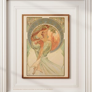 May include: A framed art print depicting a woman with flowing red hair and a laurel wreath, in a pastel colour palette. The artwork has a vintage style, with a circular design element and decorative borders. The print is in a wooden frame.
