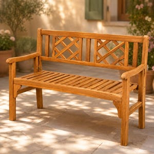 May include: A light brown wooden bench featuring a slatted seat and a backrest with two distinct sections, each containing a decorative lattice pattern. The bench has curved armrests and four sturdy legs, constructed from natural wood.