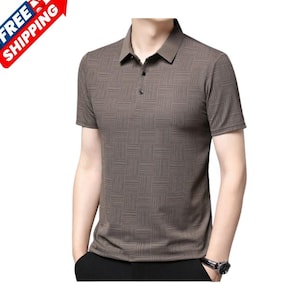 May include: A short-sleeved polo shirt in a brown geometric pattern. The shirt has a collared neckline and a three-button placket. The image includes a red and blue banner with the words "FREE SHIPPING".
