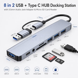 May include: A gray 8-in-2 USB and Type-C docking station with a 138mm length, 28mm width, and 10mm height. It features USB 3.0, USB 2.0, Type-C, 3.5mm audio, and TF/SD card slots. Includes a USB-C and USB 3.0 connector cable and a SanDisk memory card.