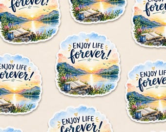 May include: A collection of die-cut stickers featuring a watercolor landscape of a lake at sunset with mountains, a rocky shore, an open book, and a blue mug. The text "ENJOY LIFE forever!" is printed in dark blue script at the top of each sticker.