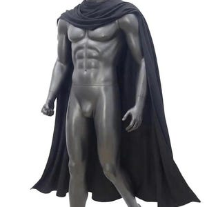 May include: A solid black cape featuring a draped neckline that secures around the shoulders and extends down the back. The fabric is opaque and hangs in soft, vertical folds, covering the shoulders and upper back while flowing freely downward.