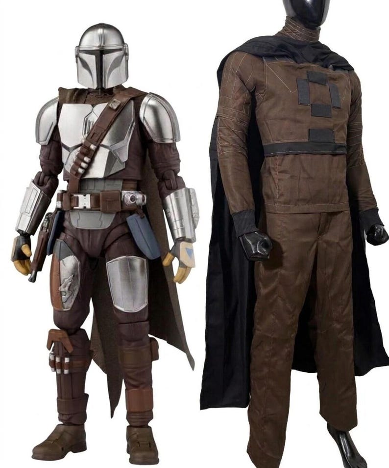 May include: A Mandalorian action figure with a silver helmet and armor plates over a brown suit, standing next to a mannequin wearing a brown long-sleeved shirt with black rectangular patches, matching brown trousers, and a black cape.