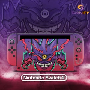 以下が含まれることがあります： 紫と赤のグラデーションスキンが施されたNintendo Switch 2本体。額に第三の目を持つ赤い目の紫色のクリーチャーが描かれています。ドックにも同じクリーチャーのデザインと赤い稲妻が描かれています。