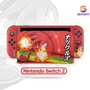 Puede incluir: Piel de consola Nintendo Switch 2 roja con el personaje Knuckles de la serie Sonic the Hedgehog. La piel tiene un fondo rojo con texto japonés y un gráfico de Knuckles. El logotipo de Skinify está en la esquina superior derecha.