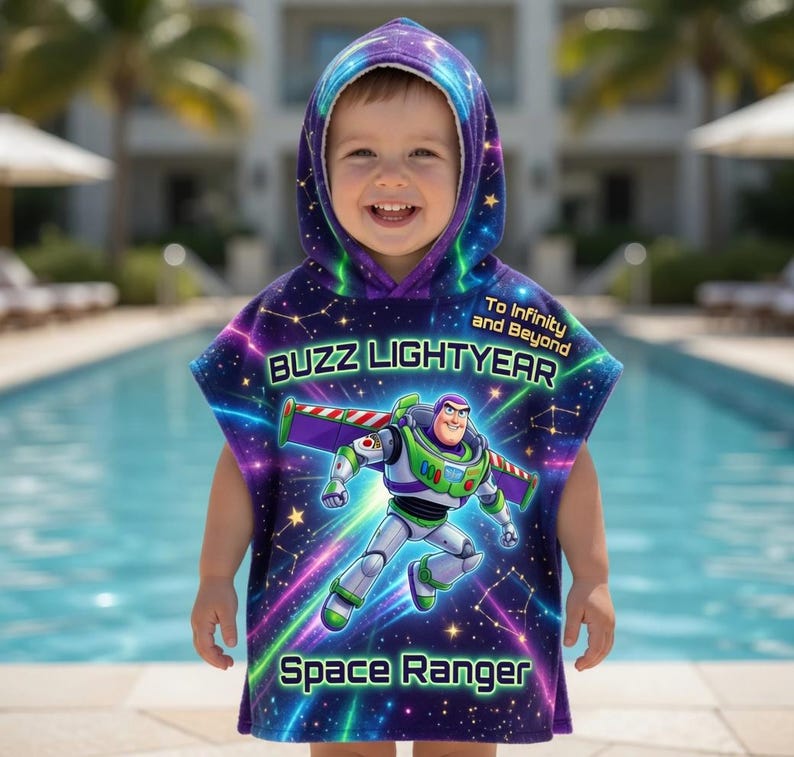 May include: A child's hooded towel with a Buzz Lightyear design. The towel is predominantly purple with a space theme, a Buzz Lightyear graphic, and the phrases "Buzz Lightyear", "To Infinity and Beyond", and "Space Ranger".