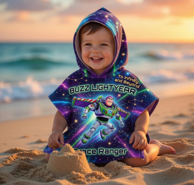 May include: A child's hooded poncho featuring Buzz Lightyear. The poncho has a space-themed design with the character's image and the text "Buzz Lightyear Space Ranger". The poncho is purple, blue, and green, with the words "To Infinity and Beyond".