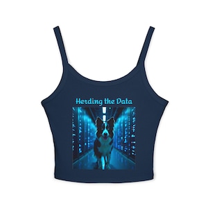 May include: A navy blue crop top with thin straps. It displays a graphic of a Border Collie dog in a data centre, with the text "Herding the Data" in light blue.