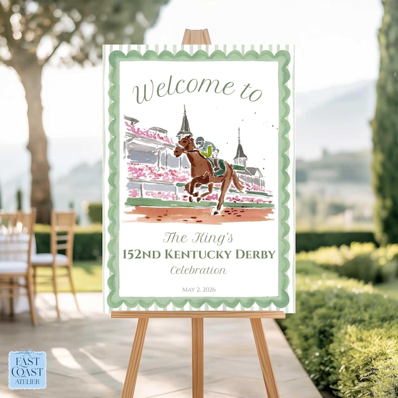 May include: A wooden easel displays a sign with a watercolor illustration of a horse race. The sign reads "Welcome to The King's 152nd Kentucky Derby Celebration" with the date May 2, 2026. The sign has a green scalloped border.