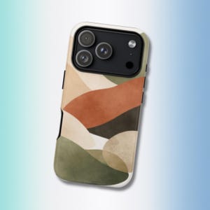 May include: A smartphone case featuring an abstract design with earth-tone colors. The case has a white border and a pattern of overlapping shapes in shades of green, brown, and beige. The phone's camera lenses are visible at the top.