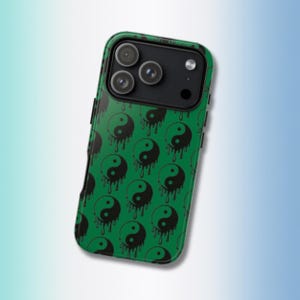 May include: A smartphone case featuring a repeating pattern of black yin-yang symbols on a vibrant green background. Each symbol appears to have a dripping effect, with black liquid-like trails extending downward from the circular icons.