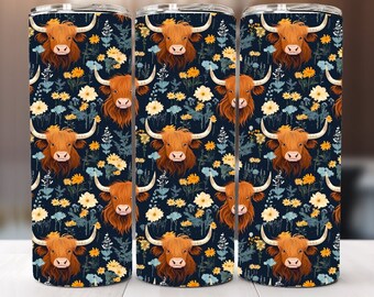 May include: Three stainless steel tumblers with a repeating pattern of a Highland cow's face, yellow and white flowers, and blue foliage on a dark navy background. The tumblers have a silver rim and lid.
