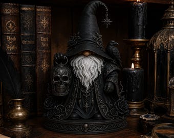 May include: A black figurine of a bearded wizard wearing a tall pointed hat with a hanging star charm. The wizard holds a skull-shaped lantern and has a raven perched on one shoulder. The base is decorated with roses and a small skull emblem.