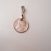 see more listings in the Vintage coin pendant section