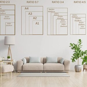May include: A room interior with a beige sofa, armchair, and a wooden floor. The wall displays print size ratios with dimensions in inches and centimeters, including 16x24in, 12x18in, 8x12in, 4x6in, and others.