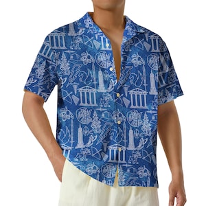 May include: Blue button-down shirt with a white illustrated pattern of architectural elements, lightning bolts, and mythological figures. The short-sleeved shirt has a classic collar and a relaxed fit, perfect for casual wear.