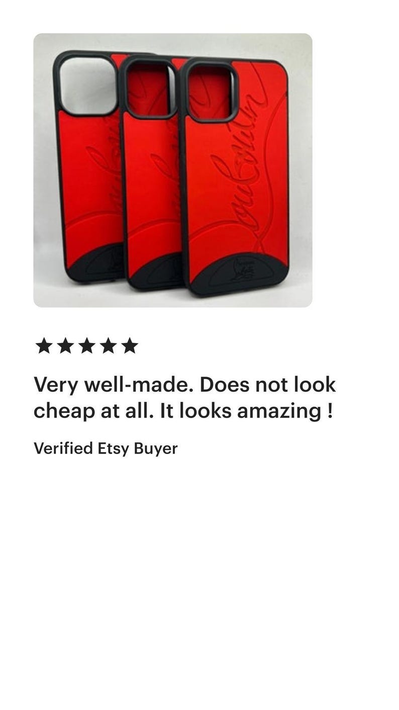 May include: Red phone cases with black trim. The cases have a curved design and a logo on the back. The cases are shown in a group of three. The cases are for a phone.