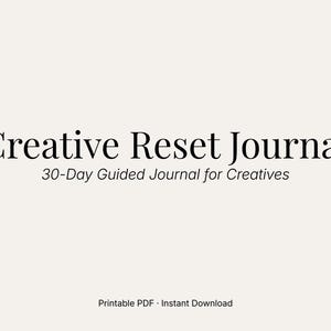 May include: A digital download titled "Creative Reset Journal" with the subtitle "30-Day Guided Journal for Creatives." The text is in a stylish serif font on a cream background. The bottom of the image reads "Printable PDF • Instant Download."