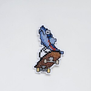 Skateboarding fish cross-stitch pattern