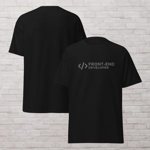 May include: Black t-shirts with the text "FRONT-END DEVELOPER" in gray. The design includes code brackets. The shirts are displayed on a light background.