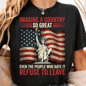 May include: A white ceramic mug with a black handle and the text "But First, Coffee" in a bold, black font. The mug is set against a neutral background, highlighting its simple design.