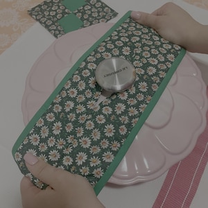 Handmade Daisy Pot Handle Sleeve and Quilted Potholder Set Made from Heat Resistant Fabric with Secure Grip Both with Hanging Loop