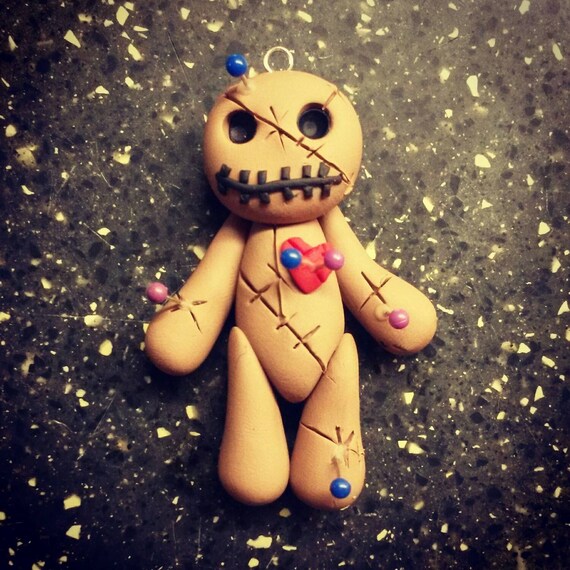clay voodoo doll