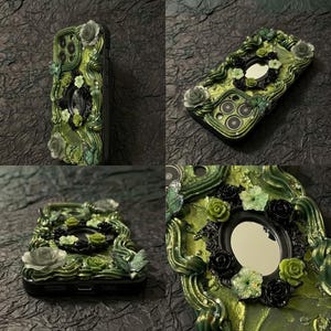 Op de afbeelding: Een decoratief telefoonhoesje met een getextureerde groene basis en wervelende reli&euml;fpatronen, versierd met groene en zwarte bloemapplicaties, kleine vlinderaccenten en een centraal ovaal spiegelkader.