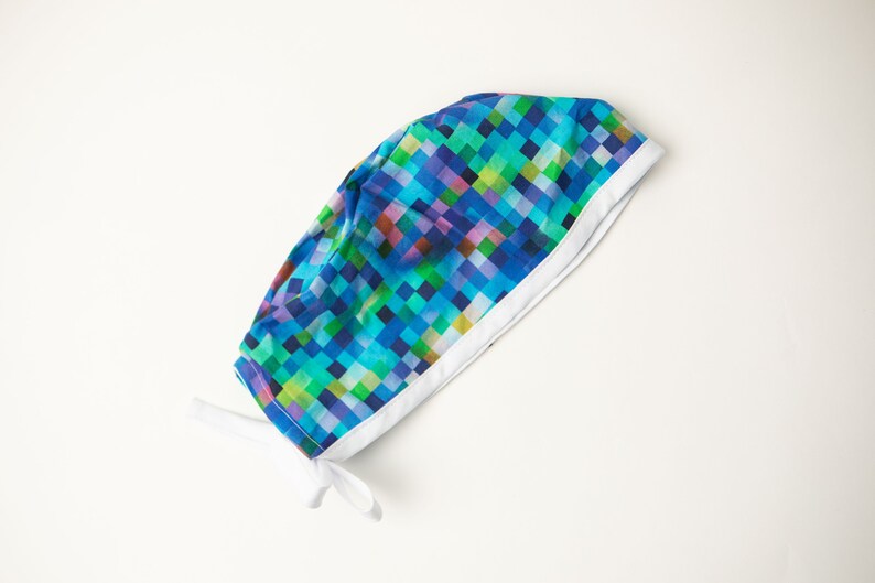 Rainbow pixel style print scrub cap that covers the whole head. Ideal for short but if hair is worn braided and pinned up can work for long hair too. Y2K, Medical surgical research Analyst, Ombre rainbow, Clinical Trial Tech, Surgical Study resident